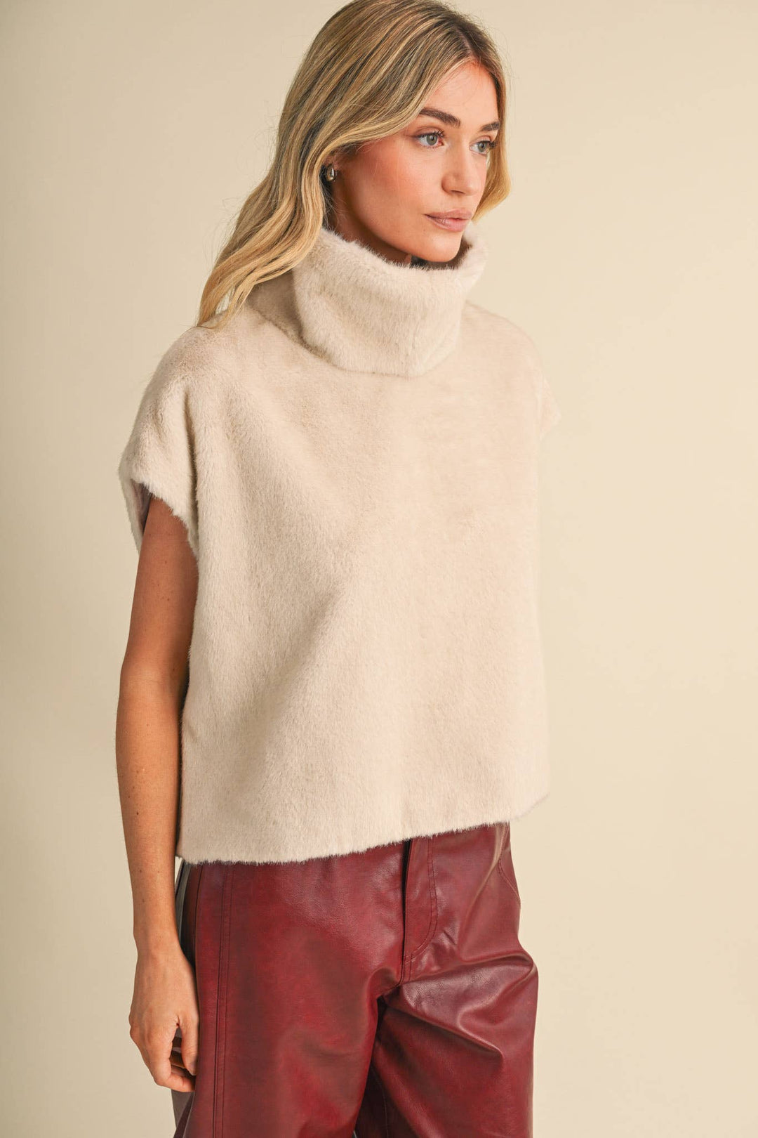 Faux Fur Cap Sleeve Turtleneck Top in Oatmeal
